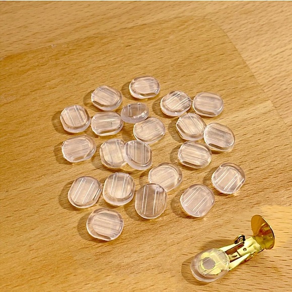 Unbranded Jewelry - 12 Pieces Earring Clip On Pads Clear and White Silicone Comfort Cushions.